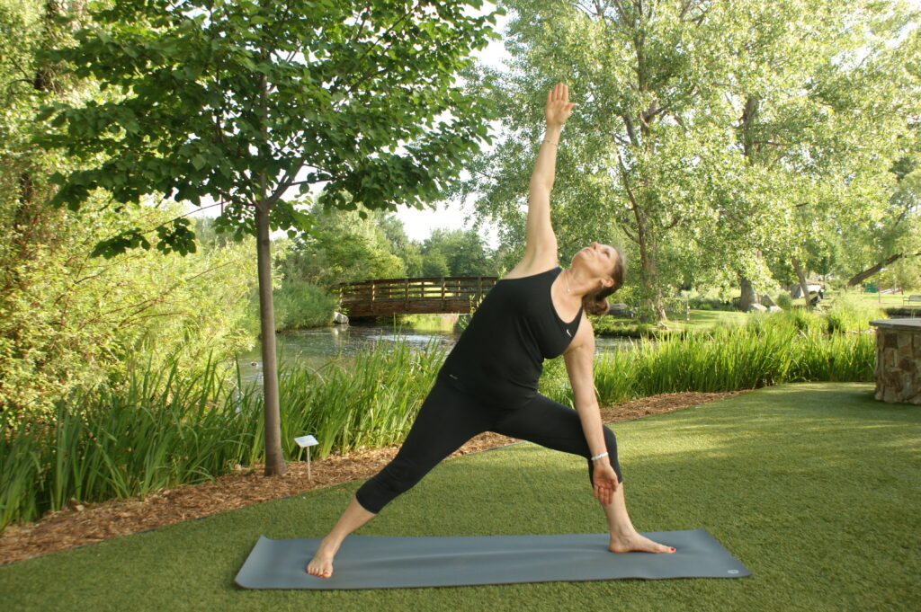 Woman in yoga pose at Hudson Gardens