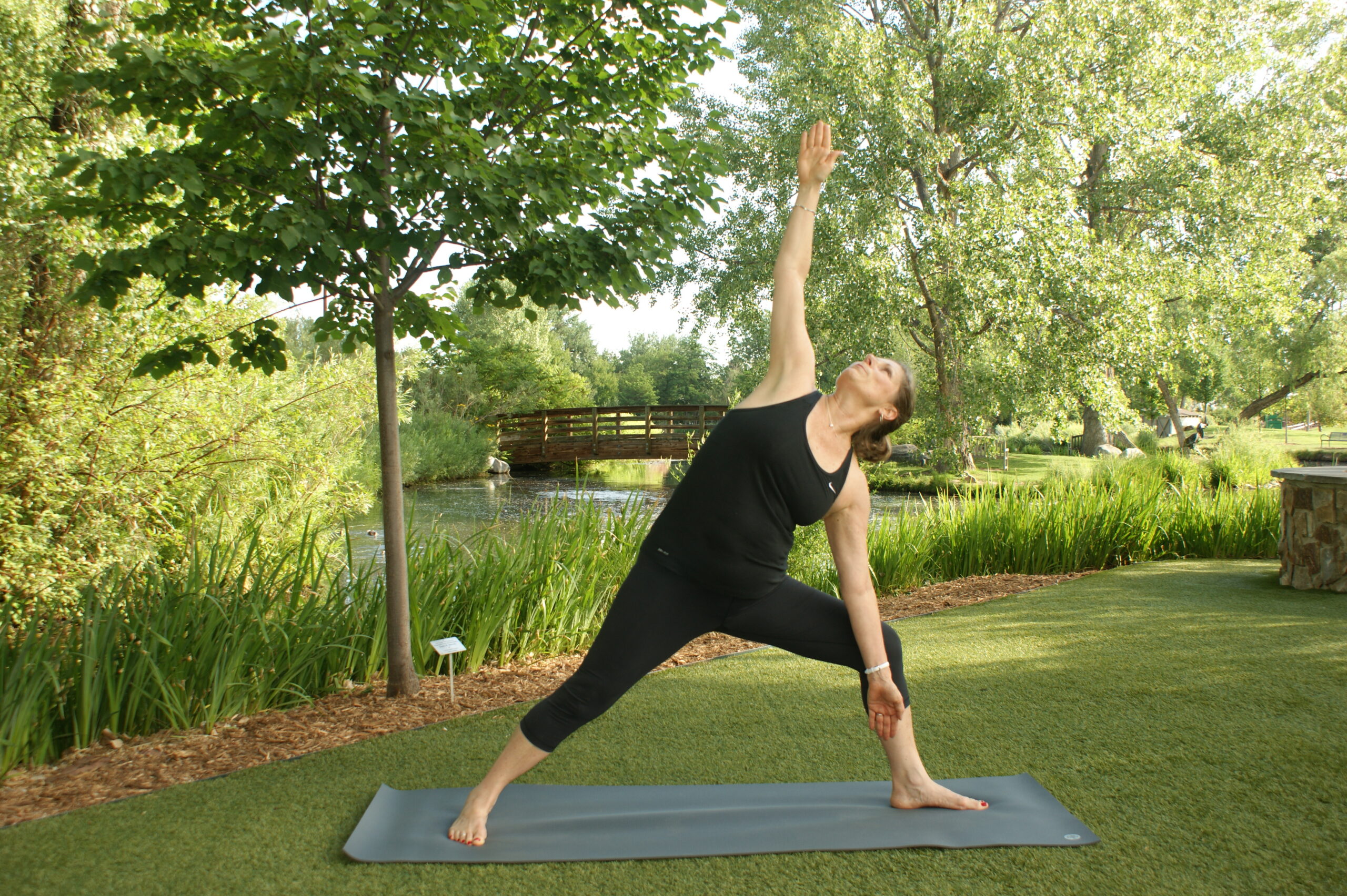 Woman in yoga pose at Hudson Gardens