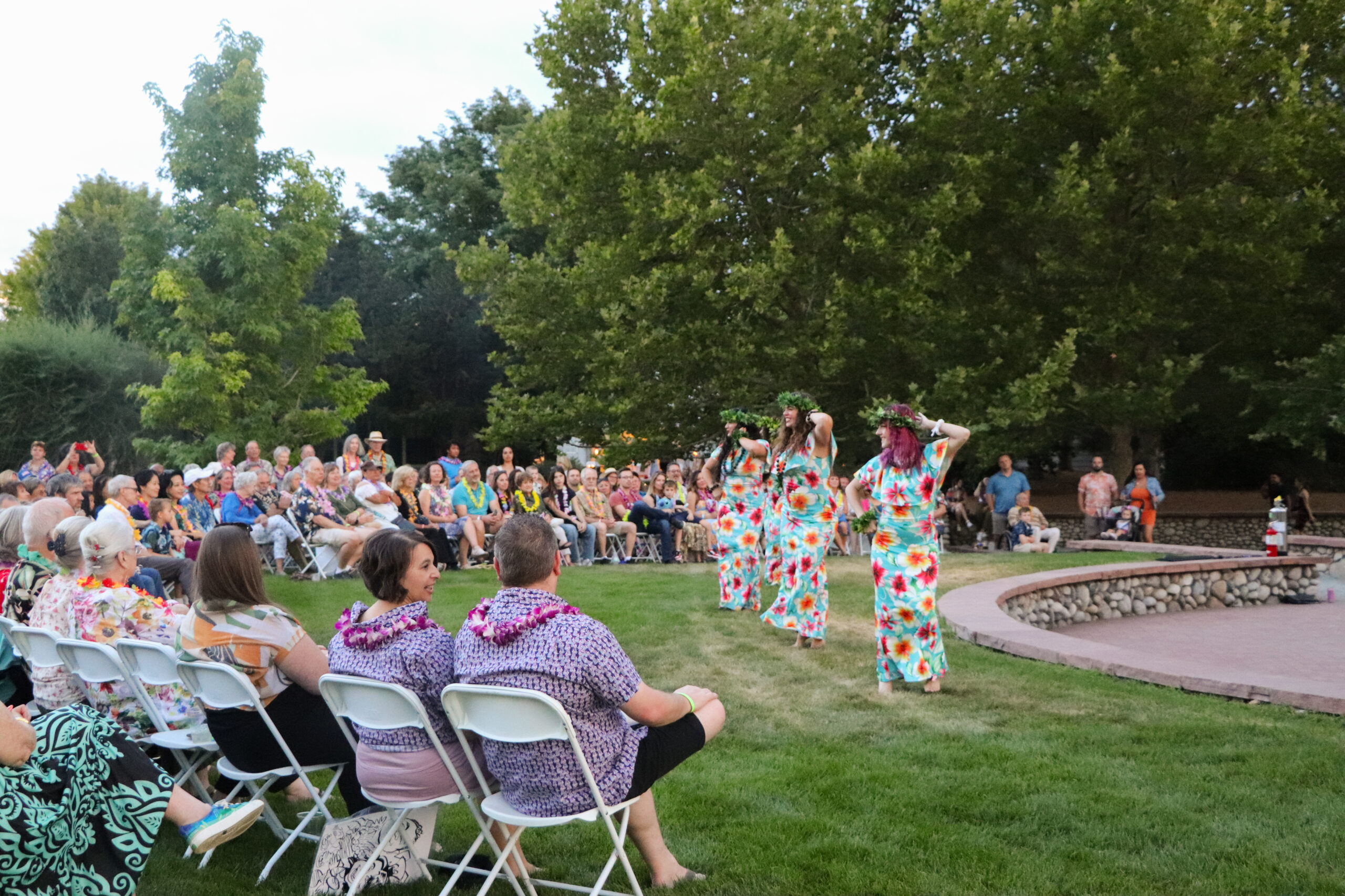 Luau dancers performing in front of an audience