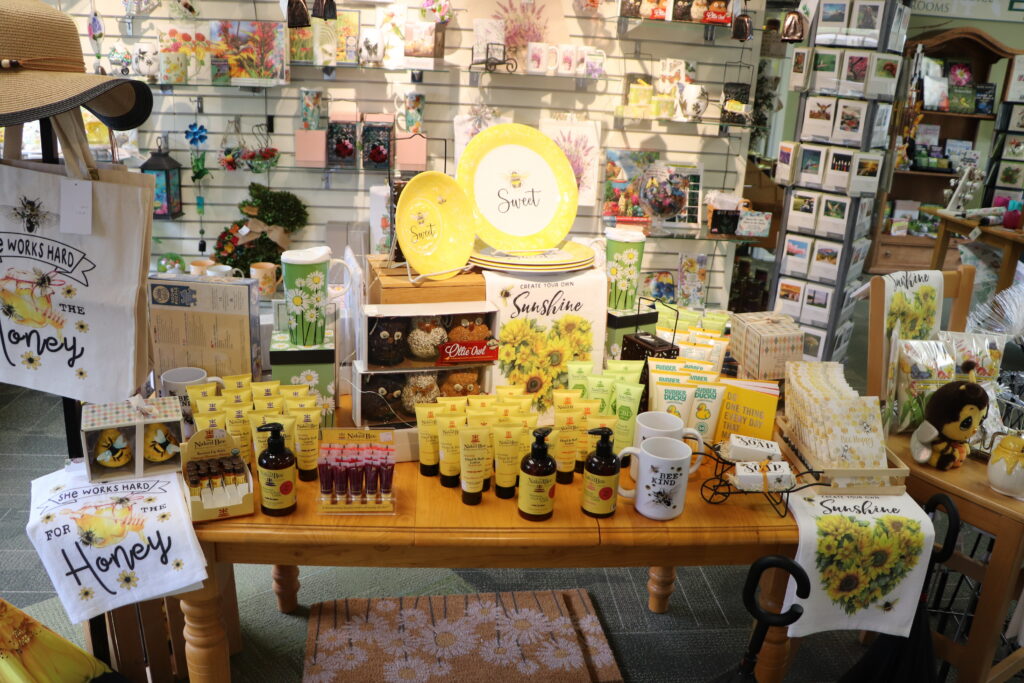Display of honey/bee-themed decor and products