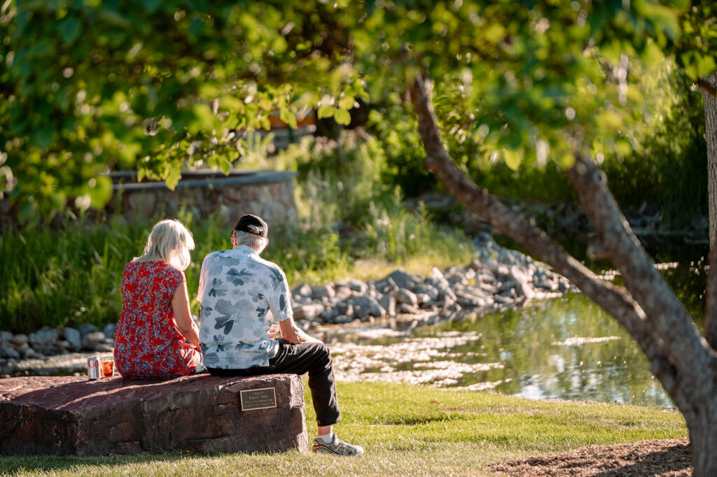 Couple sitting outside at Hudson Gardens
