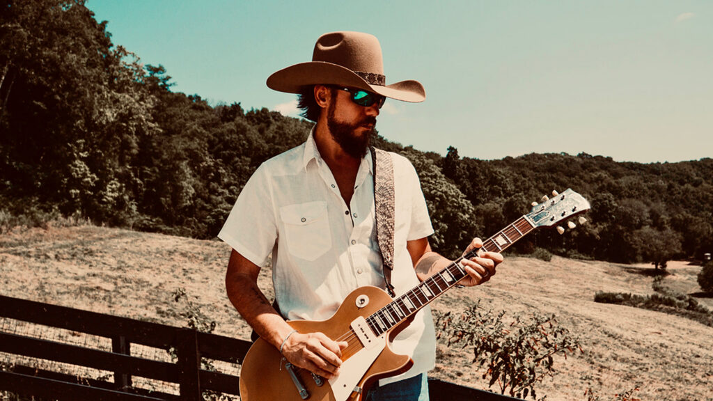 Chris Janson playing guitar
