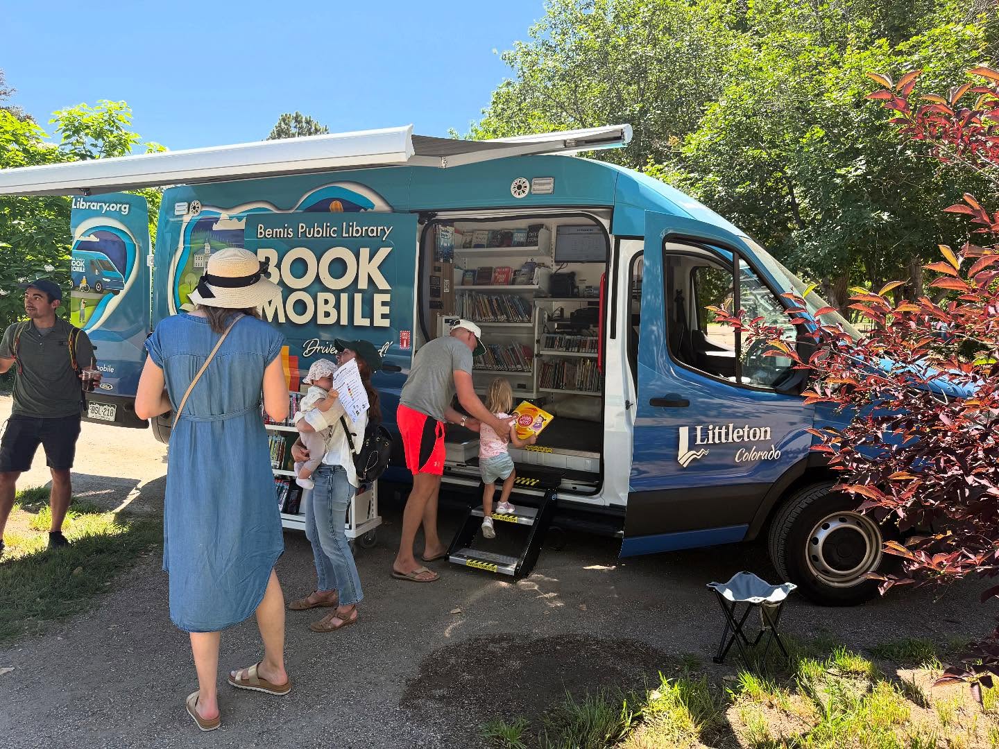 Bemis Library bookmobile with line of people
