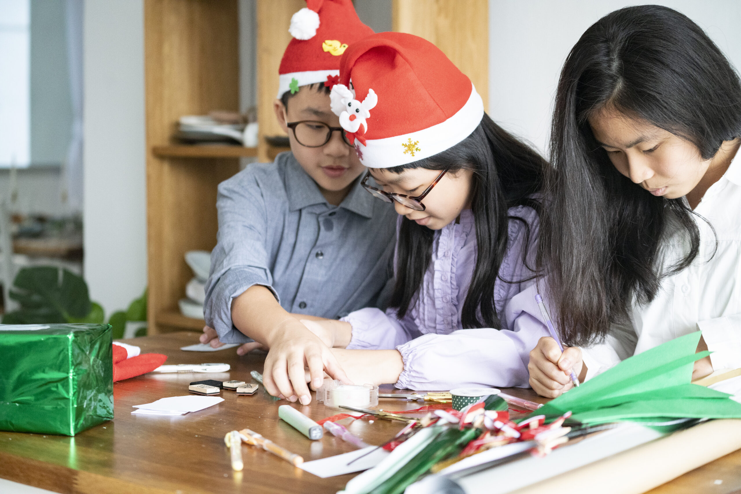 Family working on holiday crafts